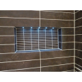Tiled alcove as shelf